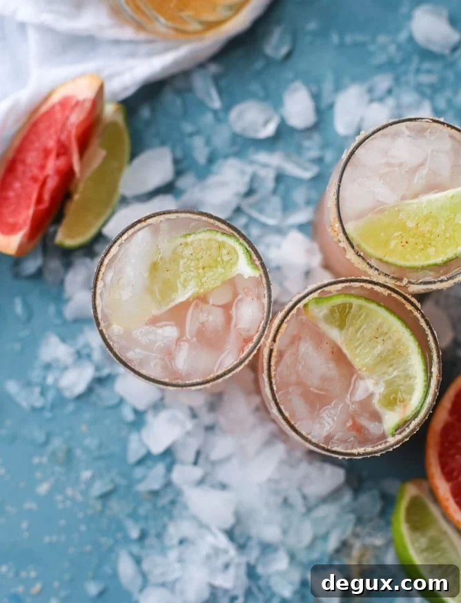 Spicy Chili Salt Pink Grapefruit Margarita Recipe 6 pink grapefruit margaritas with chili salt I howsweeteats.com