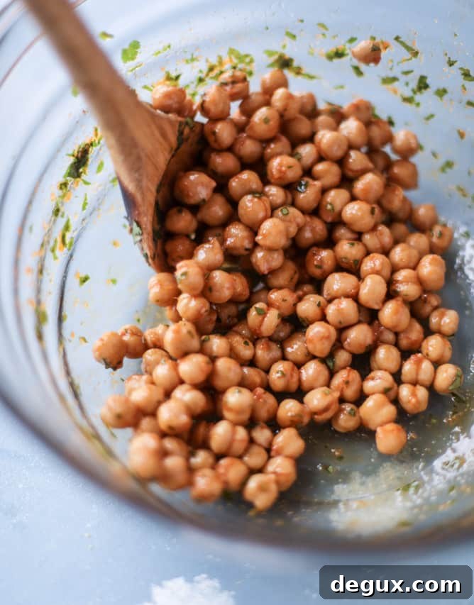 Slow-Roasted Sweet Potatoes with Spicy Garlic Chickpeas and Blue Cheese Sauce 4 slow roasted sweet potatoes with garlic chickpeas and blue cheese sauce I howsweeteats.com