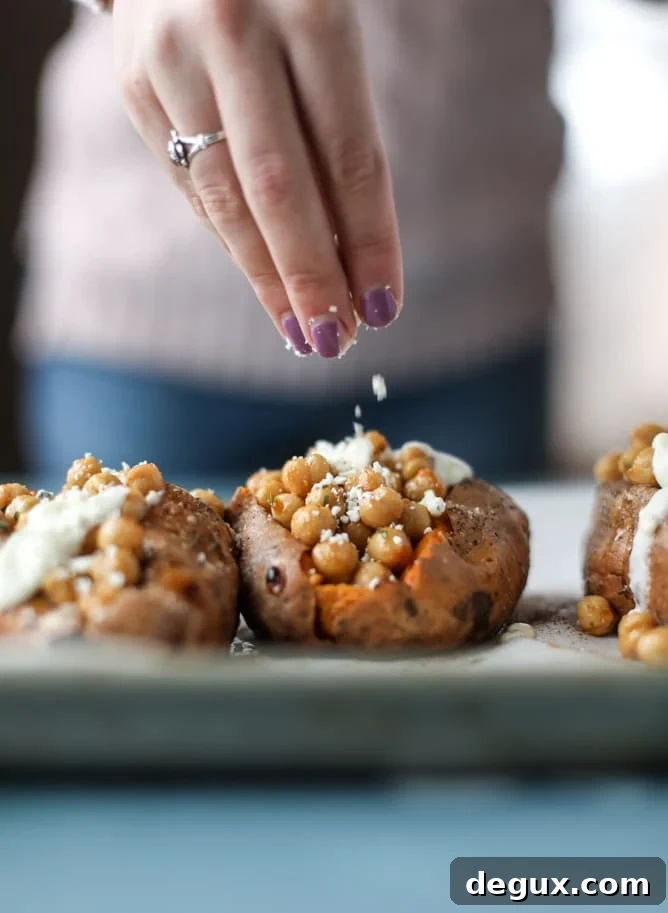 Slow-Roasted Sweet Potatoes with Spicy Garlic Chickpeas and Blue Cheese Sauce 6 slow roasted sweet potatoes with garlic chickpeas and blue cheese sauce I howsweeteats.com