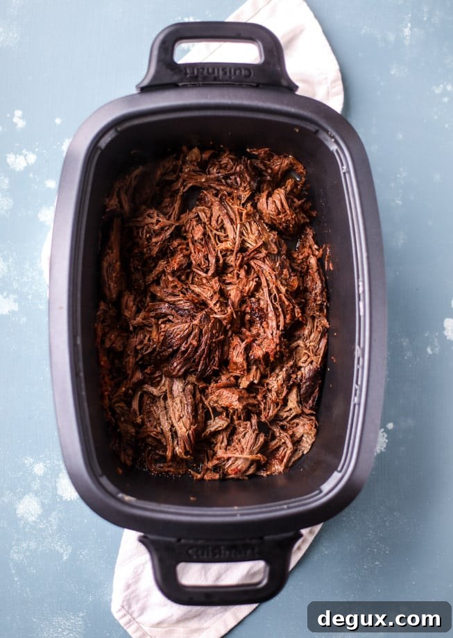 slow cooker barbacoa beef tacos I howsweeteats.com 