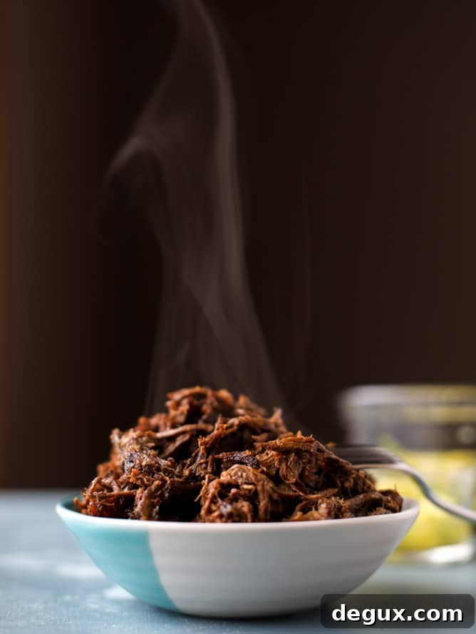 slow cooker barbacoa beef tacos I howsweeteats.com 