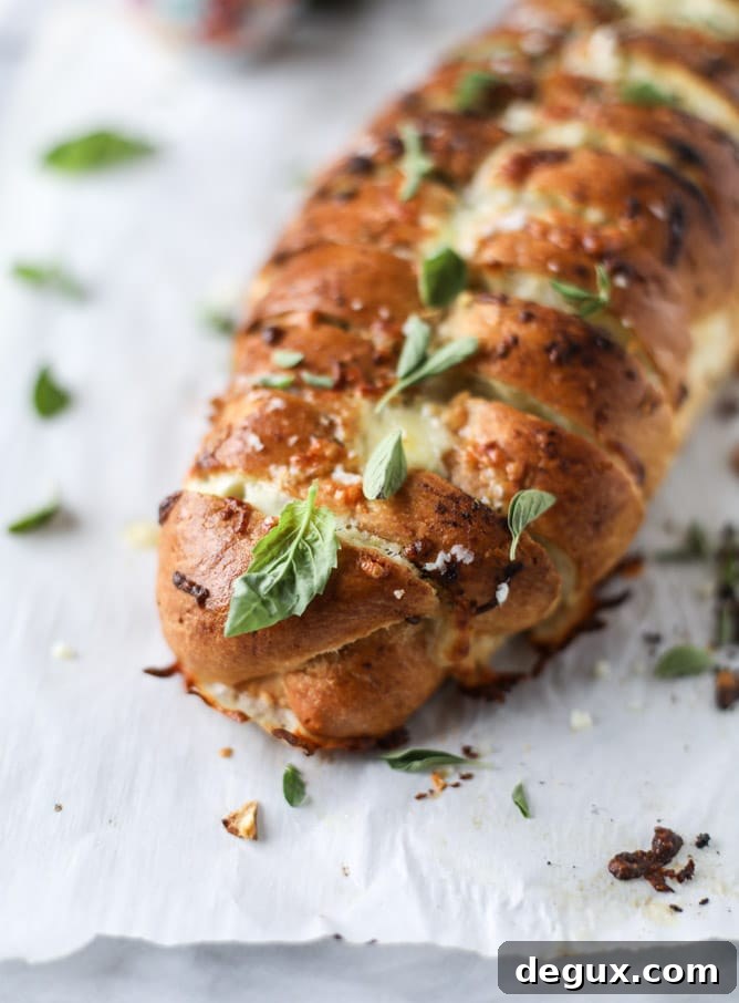 cheesy stuffed pesto garlic bread I howsweeteats.com 