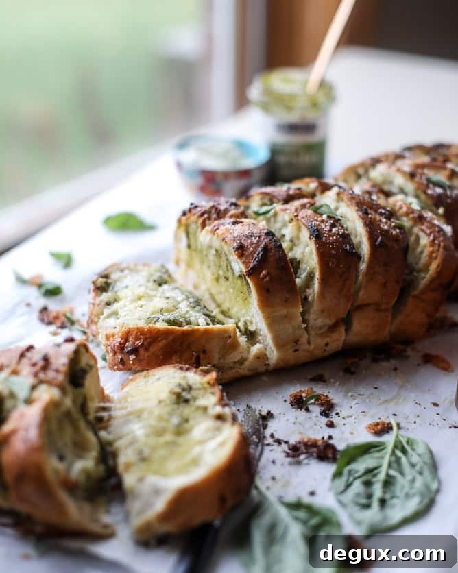 cheesy stuffed pesto garlic bread I howsweeteats.com 