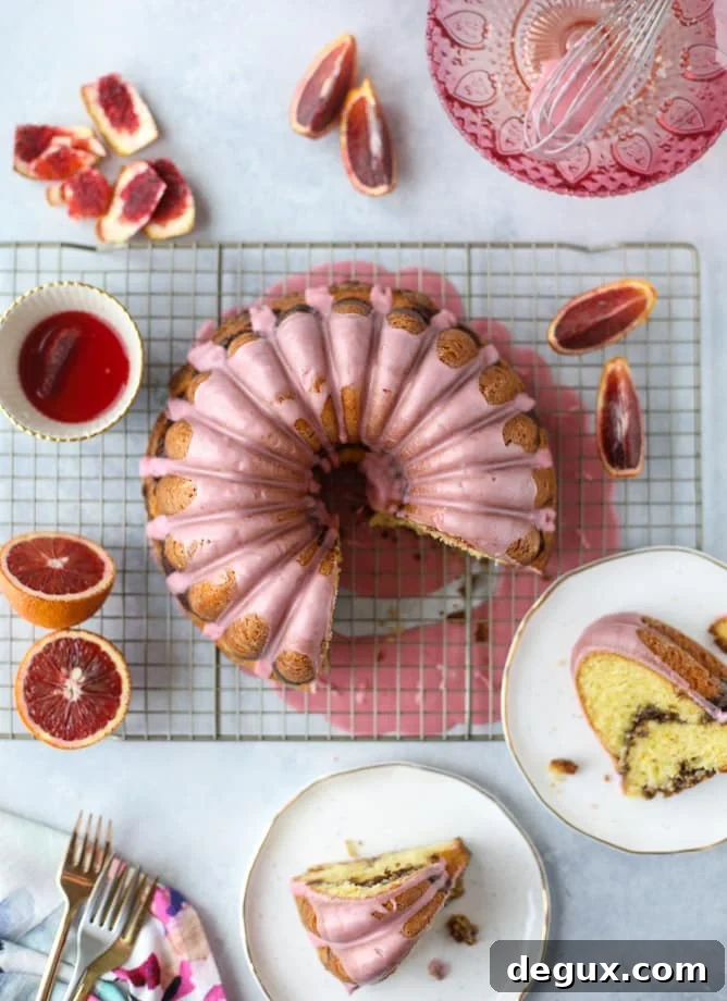 Blood Orange Coffee Cake Recipe — Citrus-Swirled Bundt Cake 2 This blood orange coffee cake is made with greek yogurt and the most delicious blood orange glaze! Perfect for a winter breakfast or brunch! I howsweeteats.com #bloodorange #coffeecake