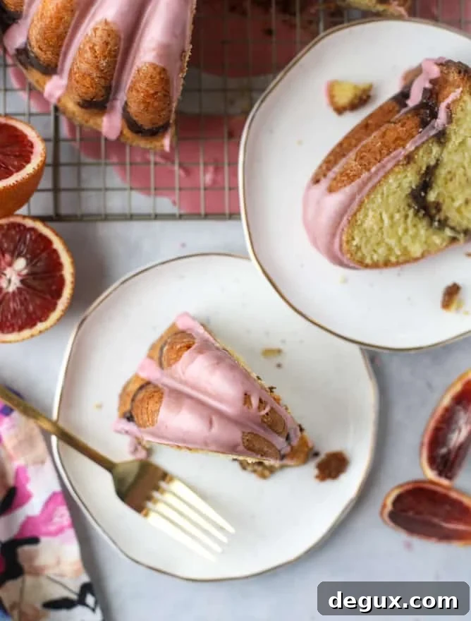 Blood Orange Coffee Cake Recipe — Citrus-Swirled Bundt Cake 12 This blood orange coffee cake is made with greek yogurt and the most delicious blood orange glaze! Perfect for a winter breakfast or brunch! I howsweeteats.com #bloodorange #coffeecake