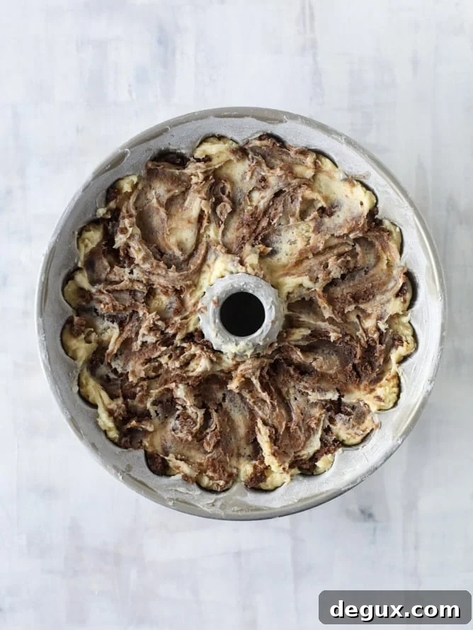 Blood Orange Coffee Cake Recipe — Citrus-Swirled Bundt Cake 4 This blood orange coffee cake is made with greek yogurt and the most delicious blood orange glaze! Perfect for a winter breakfast or brunch! I howsweeteats.com #bloodorange #coffeecake