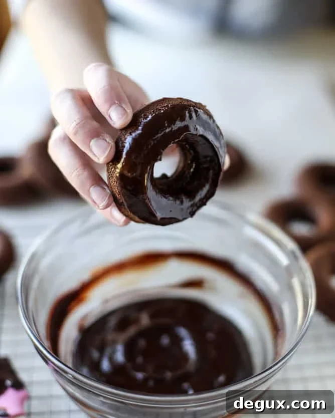baked chocolate fudge donuts I howsweeteats.com