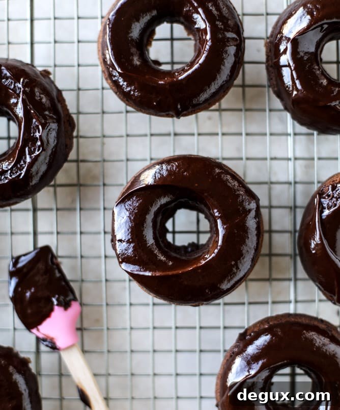 baked chocolate fudge donuts I howsweeteats.com