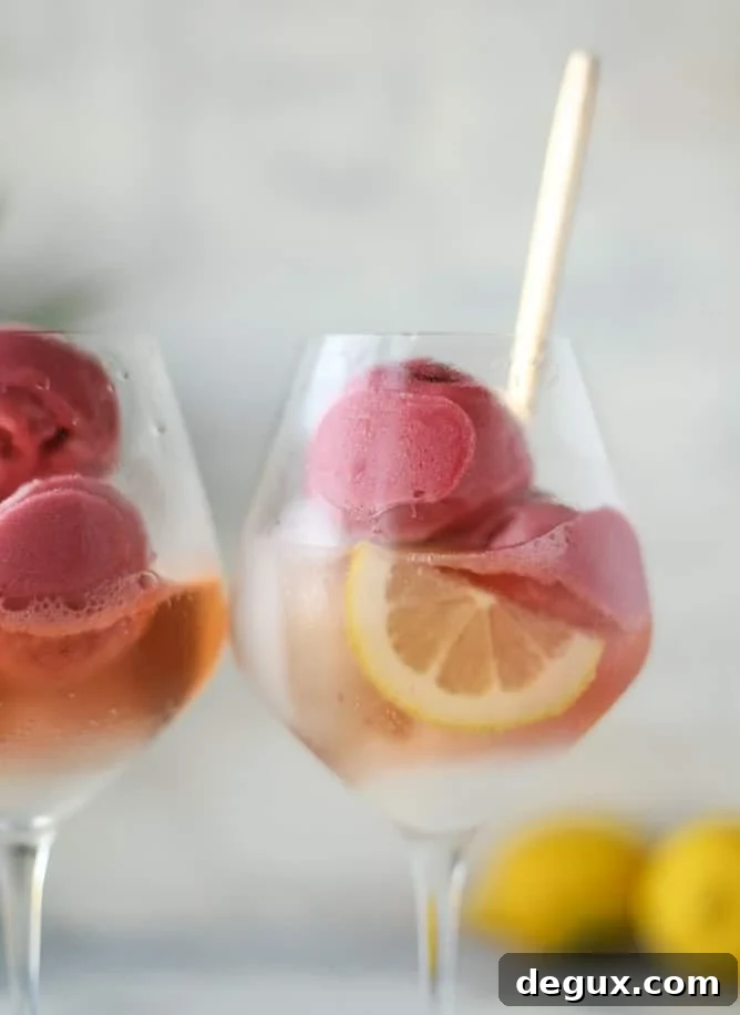 Lemon Raspberry Sorbet Prosecco Float Recipe for Summer Entertaining 2 lemon raspberry prosecco floats I howsweeteats.com