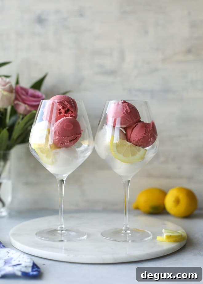 Lemon Raspberry Sorbet Prosecco Float Recipe for Summer Entertaining 3 lemon raspberry prosecco floats I howsweeteats.com