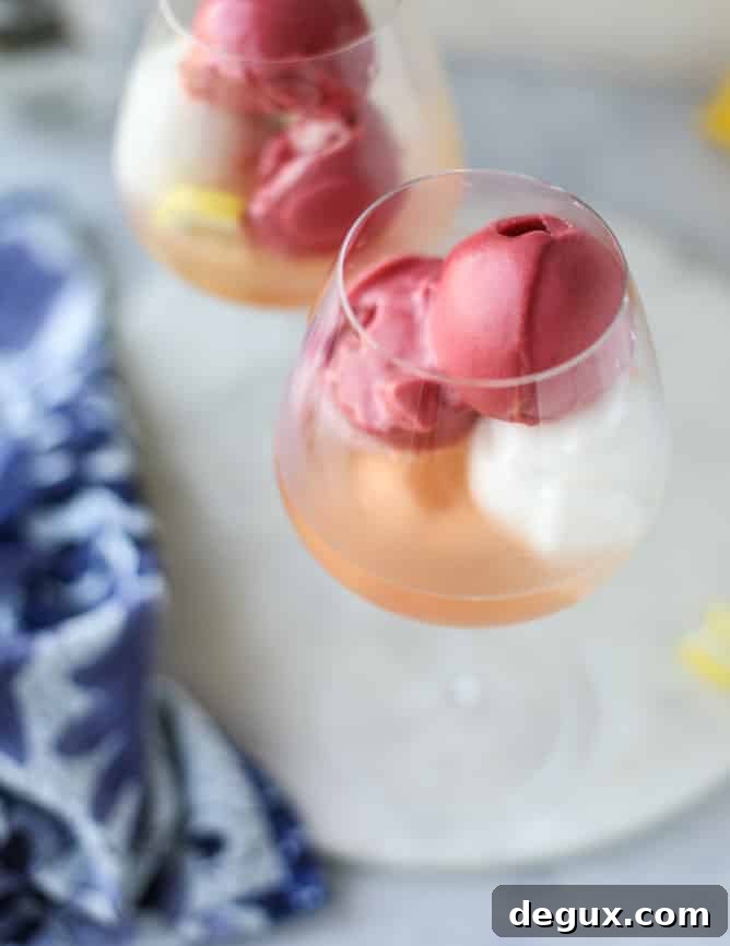 Lemon Raspberry Sorbet Prosecco Float Recipe for Summer Entertaining 5 lemon raspberry prosecco floats I howsweeteats.com