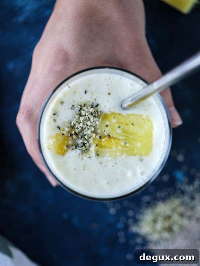Refreshing Pineapple Ginger Smoothie Recipe for Energy 8 pineapple ginger smoothie I howsweeteats.com