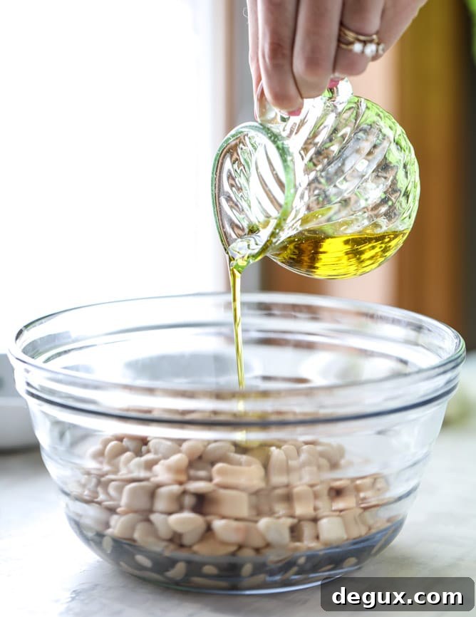 Marinated White Beans on Olive Oil Toast: Savory Brunch Recipe 3 marinated white beans with olive oil toasts I howsweeteats.com