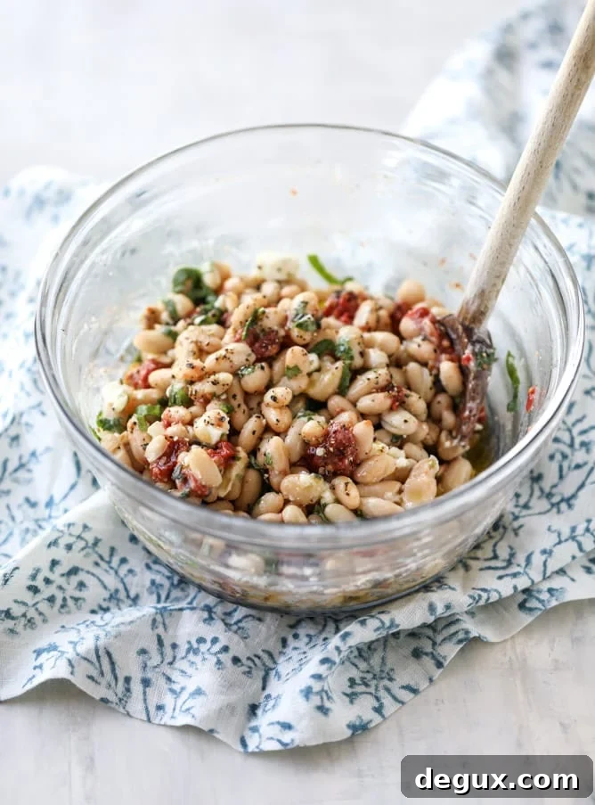 Marinated White Beans on Olive Oil Toast: Savory Brunch Recipe 6 marinated white beans with olive oil toasts I howsweeteats.com