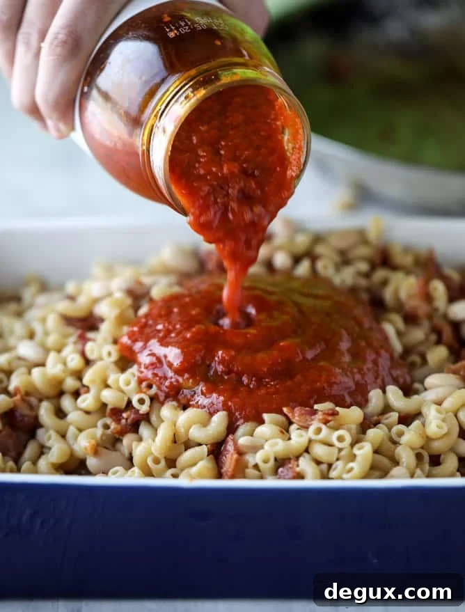 Cheesy Baked Macaroni with White Beans and Crispy Bacon (Video) 5 cheesy baked macaroni with bacon and white beans I howsweeteats.com