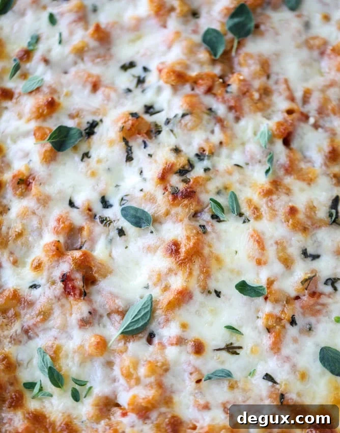 Cheesy Baked Macaroni with White Beans and Crispy Bacon (Video) 6 cheesy baked macaroni with bacon and white beans I howsweeteats.com
