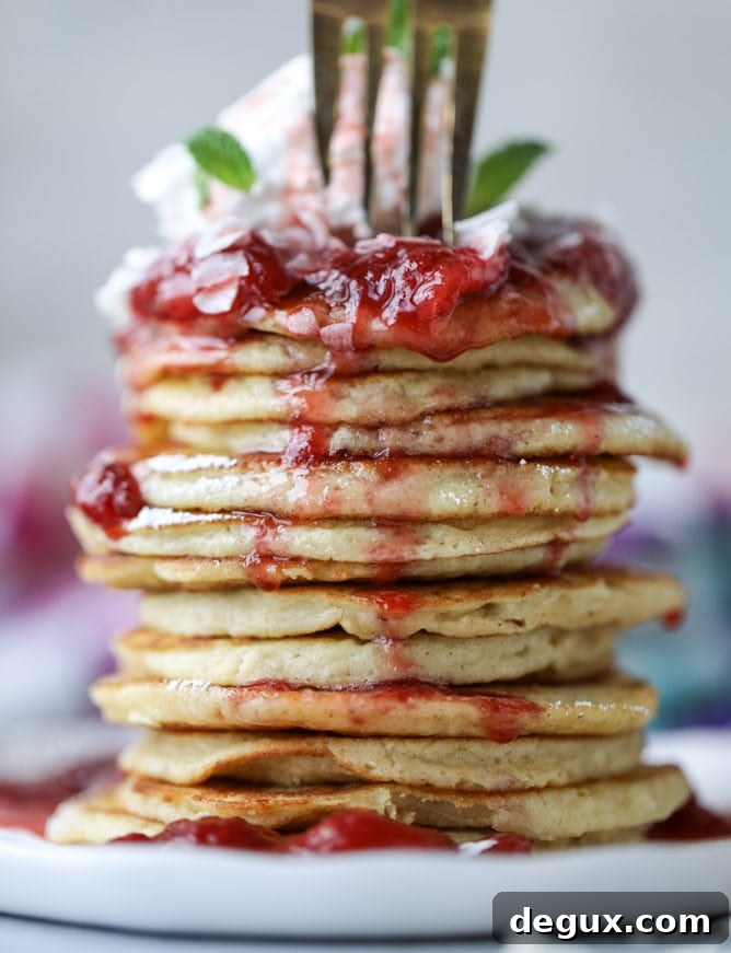 mini coconut ricotta pancakes with strawberry syrup I howsweeteats.com 