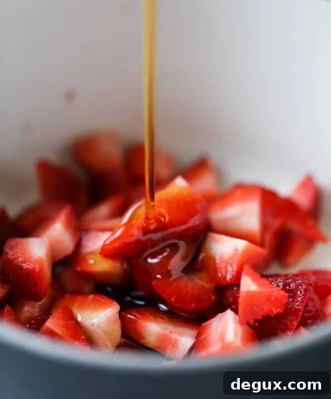 mini coconut ricotta pancakes with strawberry syrup I howsweeteats.com 