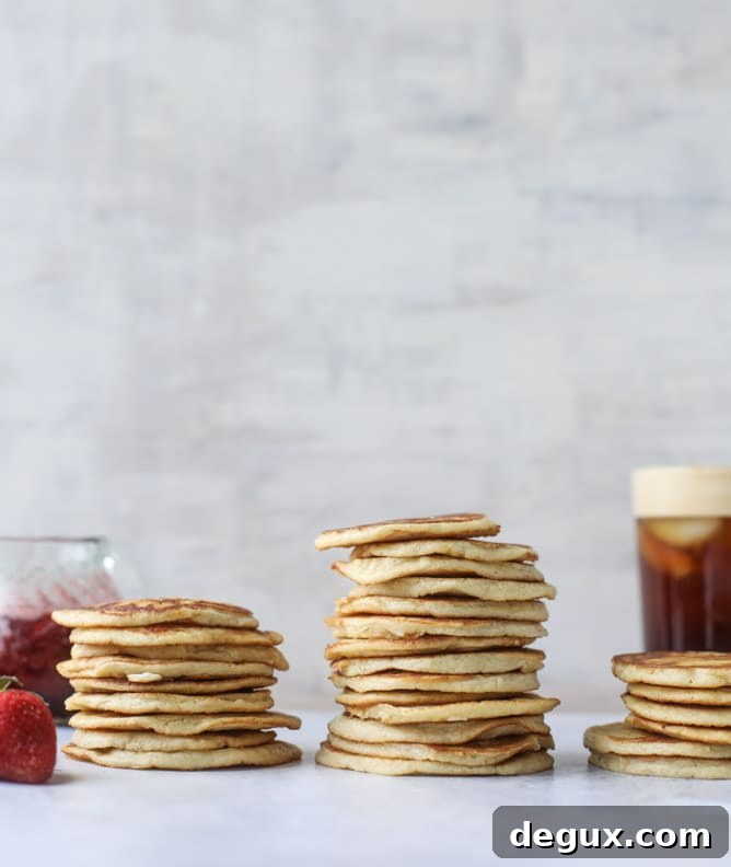 mini coconut ricotta pancakes with strawberry syrup I howsweeteats.com 
