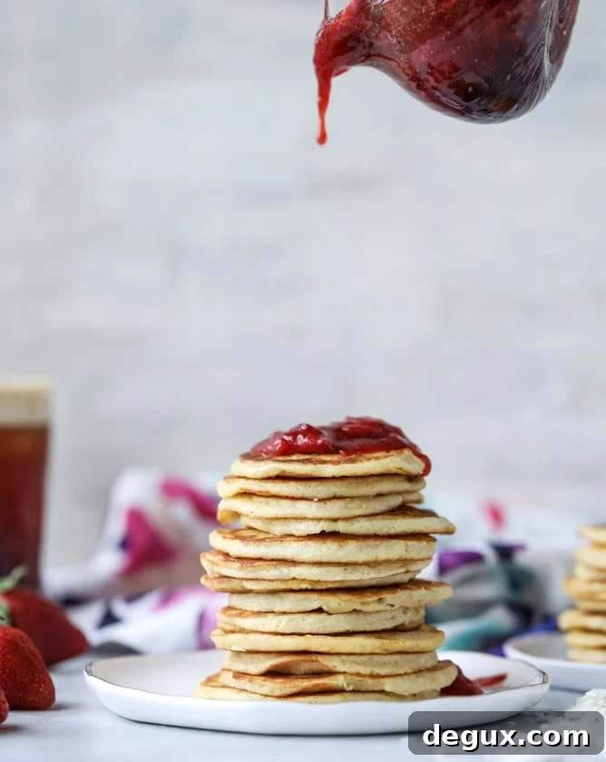 mini coconut ricotta pancakes with strawberry syrup I howsweeteats.com 