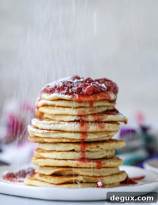 mini coconut ricotta pancakes with strawberry syrup I howsweeteats.com 