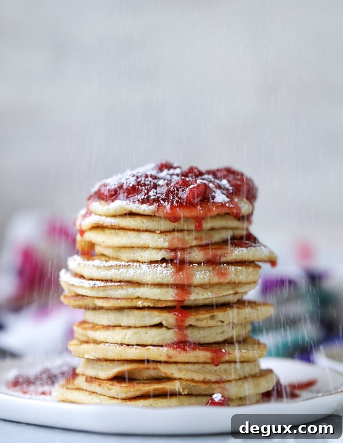 mini coconut ricotta pancakes with strawberry syrup I howsweeteats.com 