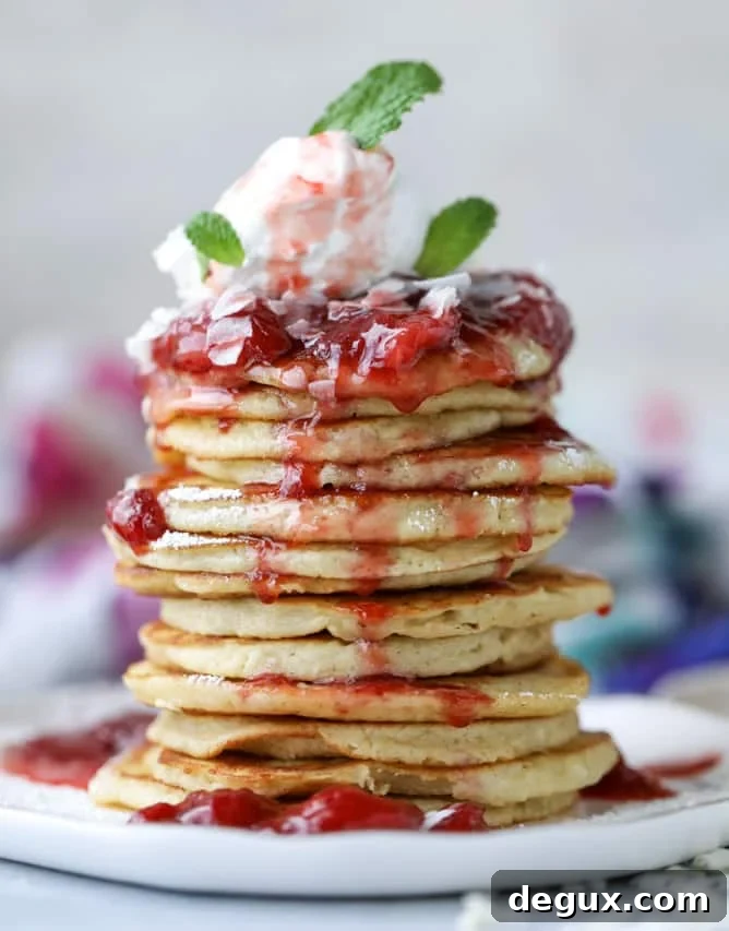 mini coconut ricotta pancakes with strawberry syrup I howsweeteats.com 