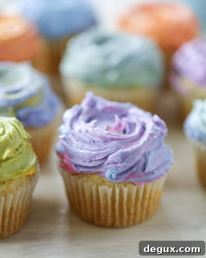 Olive Oil Cupcakes with Rainbow Mascarpone Buttercream (Video) 8 olive oil cupcakes with mascarpone buttercream