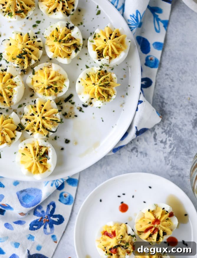 Toasted Sesame Sriracha Deviled Eggs Recipe 2 toasted sesame sriracha deviled eggs I howsweeteats.com