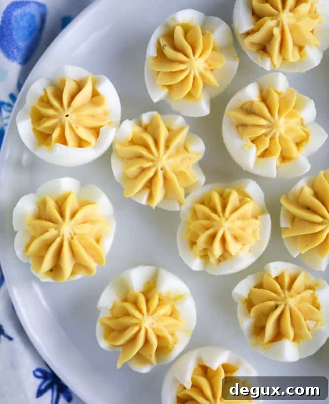 Toasted Sesame Sriracha Deviled Eggs Recipe 5 toasted sesame sriracha deviled eggs I howsweeteats.com