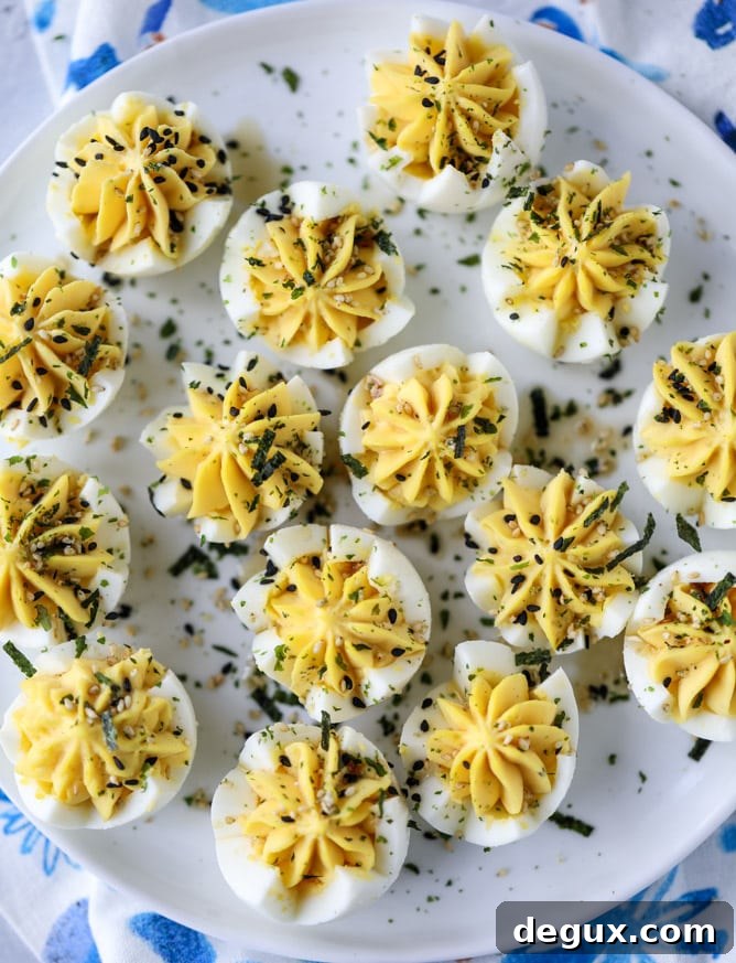 Toasted Sesame Sriracha Deviled Eggs Recipe 7 toasted sesame sriracha deviled eggs I howsweeteats.com