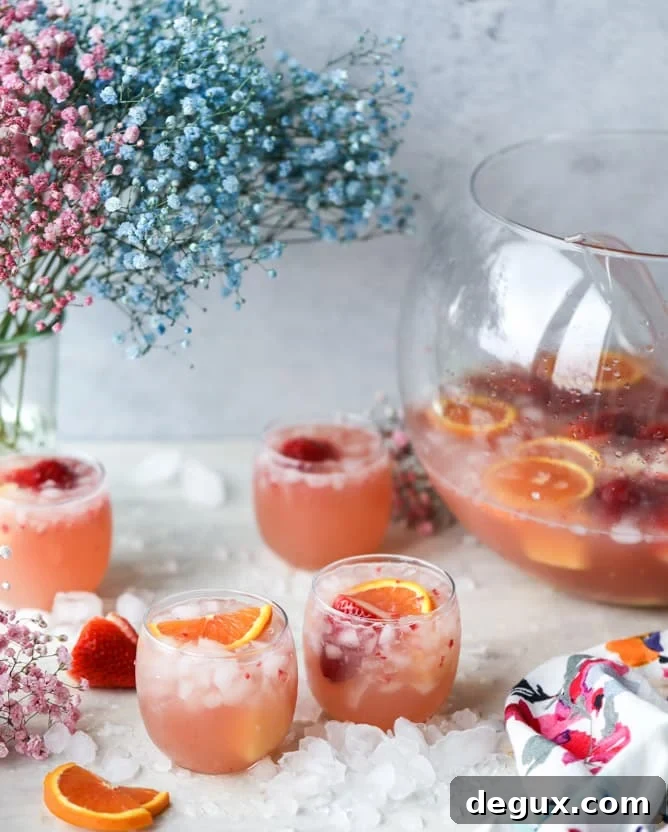 Strawberry Citrus Punch Recipe for Easter Brunch 2 strawberry citrus easter punch I howsweeteats.com