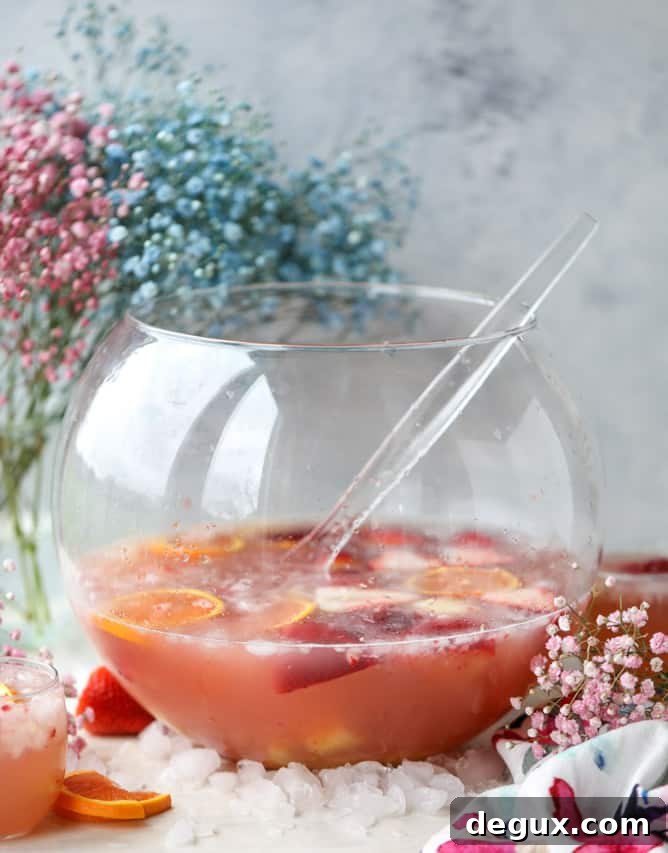 Strawberry Citrus Punch Recipe for Easter Brunch 10 strawberry citrus easter punch I howsweeteats.com