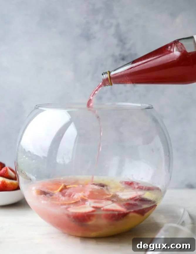 Strawberry Citrus Punch Recipe for Easter Brunch 3 strawberry citrus easter punch I howsweeteats.com