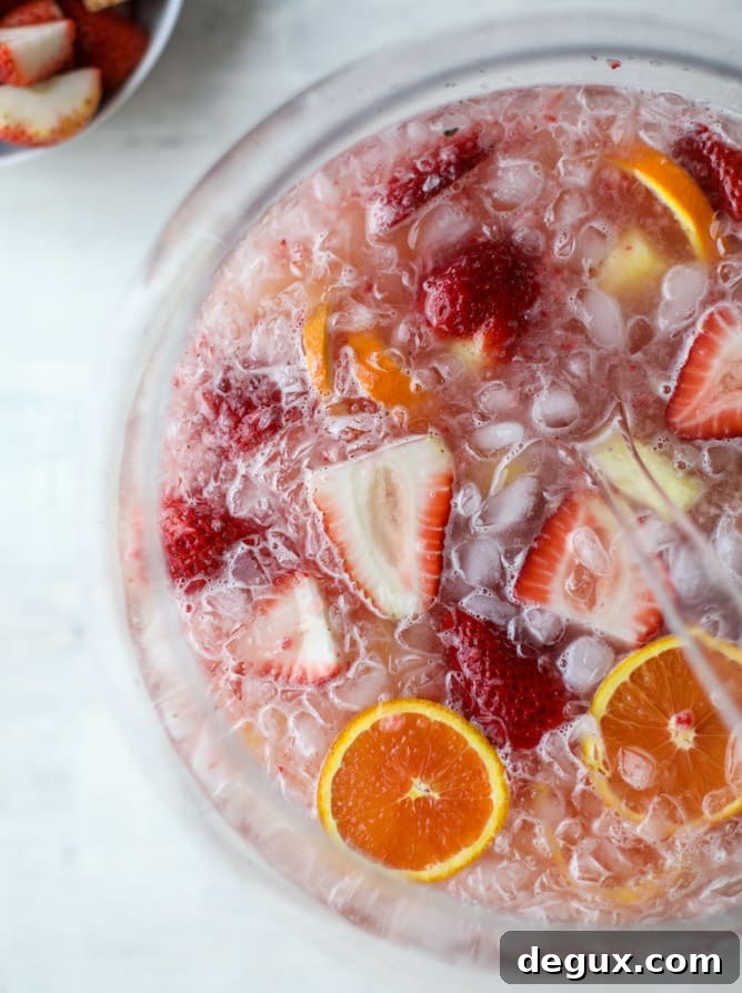 Strawberry Citrus Punch Recipe for Easter Brunch 4 strawberry citrus easter punch I howsweeteats.com