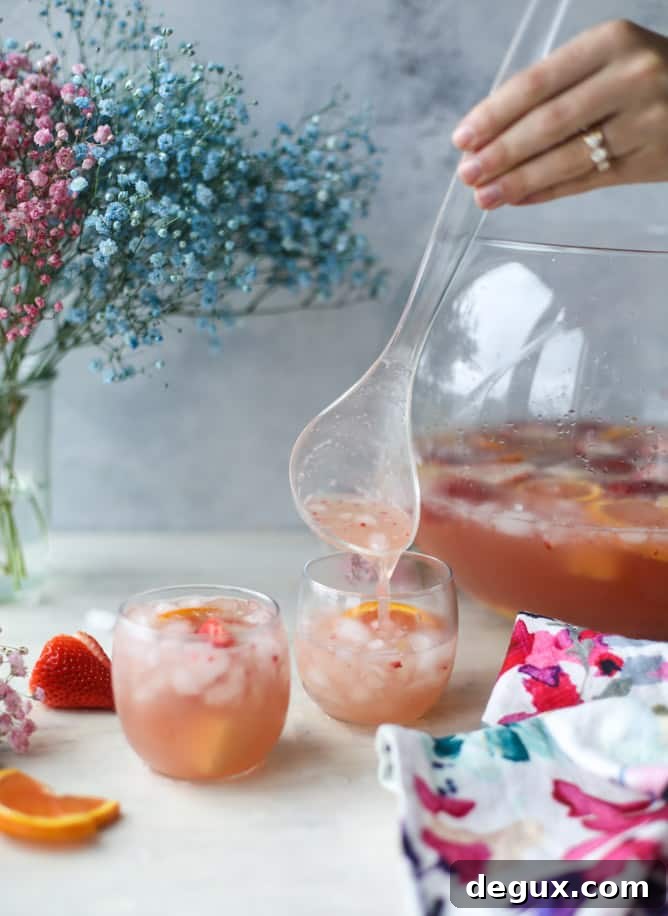 Strawberry Citrus Punch Recipe for Easter Brunch 5 strawberry citrus easter punch I howsweeteats.com