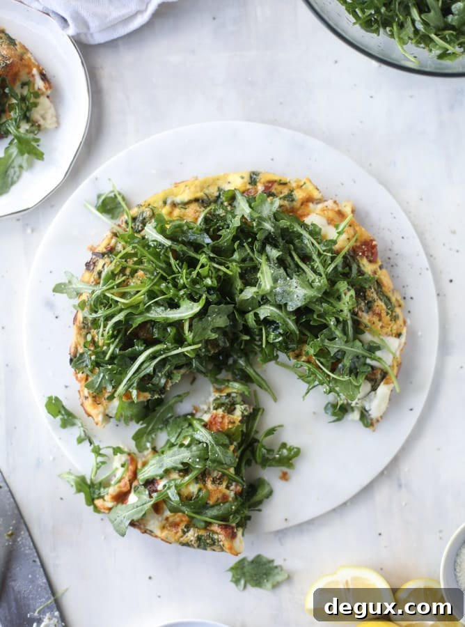 spring vegetable frittata with queso cheese and arugula I howsweeteats.com