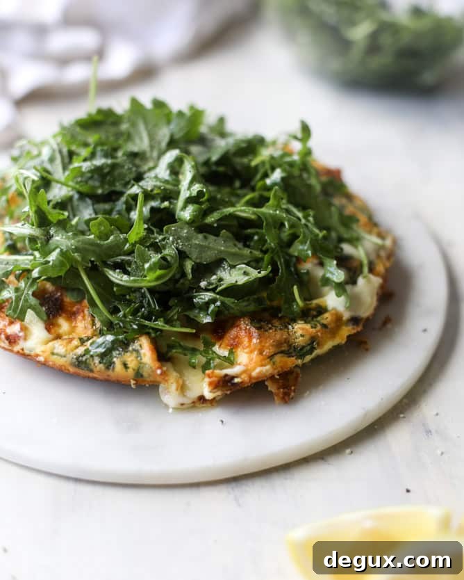 spring vegetable frittata with queso cheese and arugula I howsweeteats.com