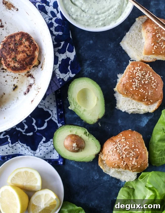 Green Goddess Salmon Burger Recipe with Herbed Avocado Sauce 4 green goddess salmon burgers I howsweeteats.com