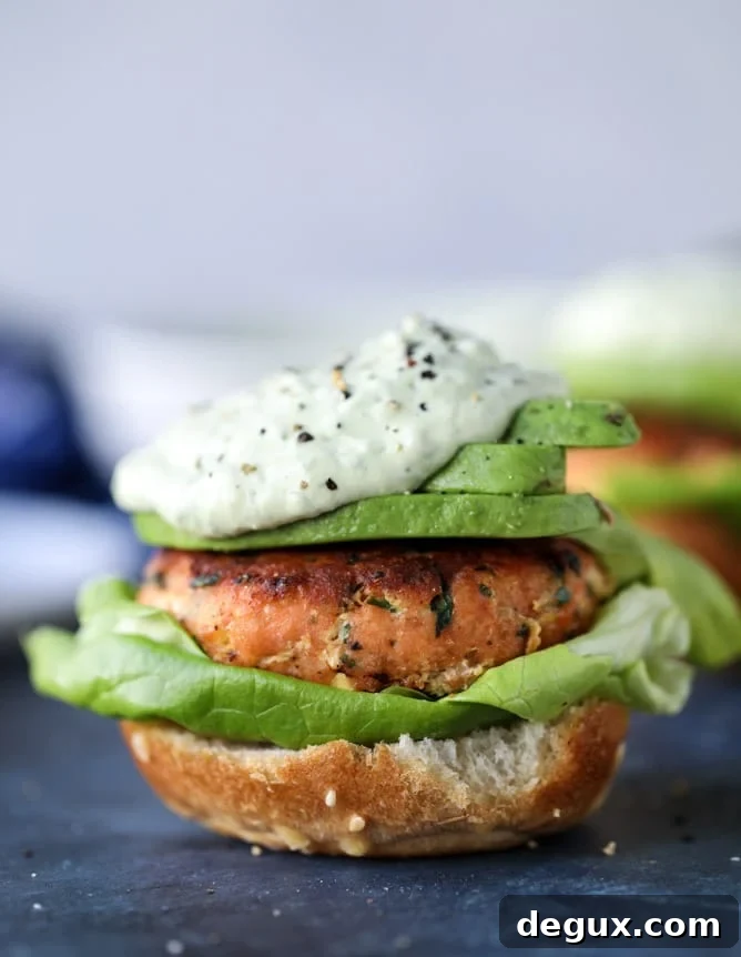 Green Goddess Salmon Burger Recipe with Herbed Avocado Sauce 5 green goddess salmon burgers I howsweeteats.com