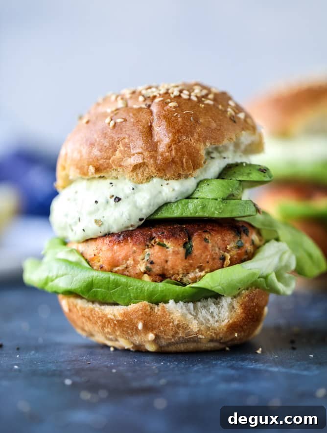 Green Goddess Salmon Burger Recipe with Herbed Avocado Sauce 9 green goddess salmon burgers I howsweeteats.com