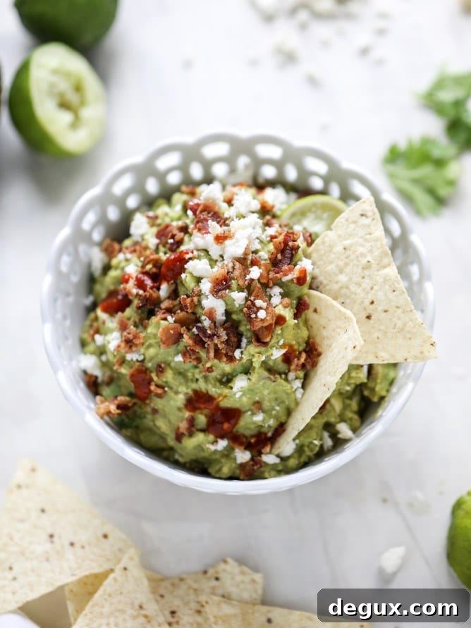 cheesy chipotle bacon guacamole I howsweeteats.com