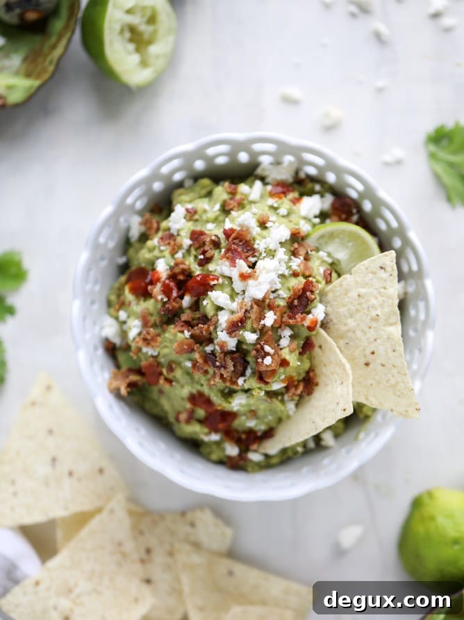 cheesy chipotle bacon guacamole I howsweeteats.com