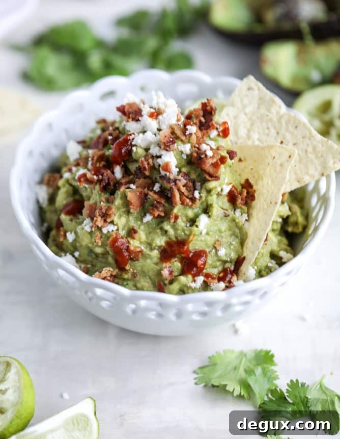 cheesy chipotle bacon guacamole I howsweeteats.com