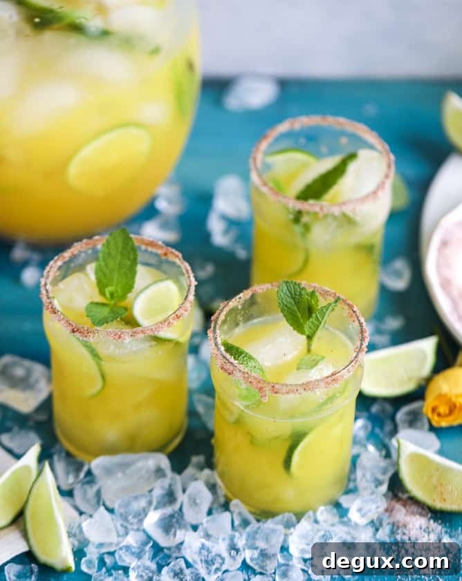 mint mango margarita punch I howsweeteats.com