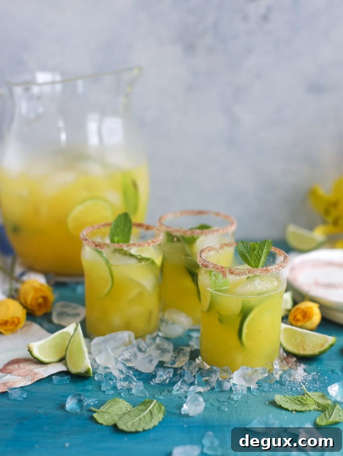 mint mango margarita punch I howsweeteats.com