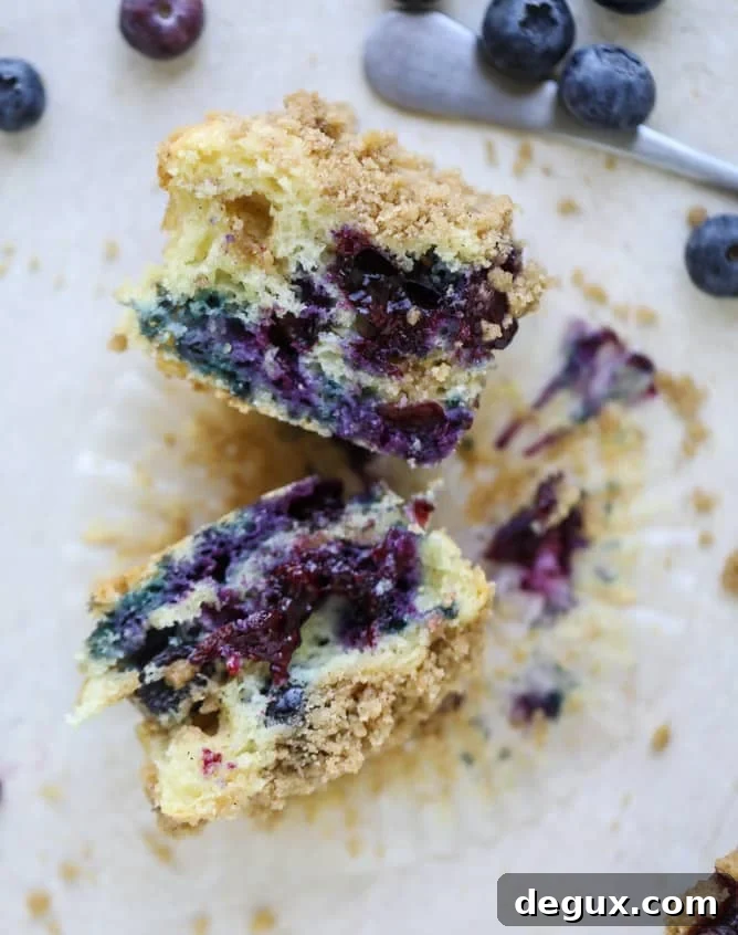 bursting blueberry coffee cake muffins I howsweeteats.com