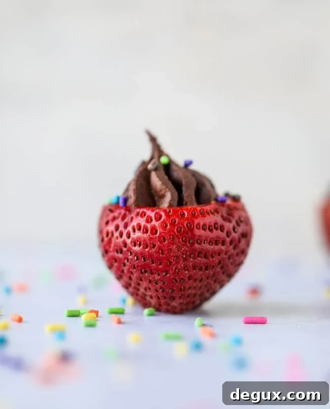 Coconut Chocolate Mousse Stuffed Strawberries — Decadent Bites 2 coconut chocolate mousse filled strawberries I howsweeteats.com