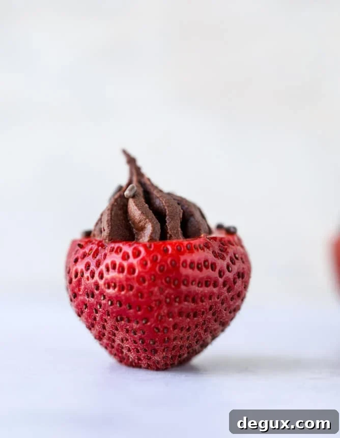 Coconut Chocolate Mousse Stuffed Strawberries — Decadent Bites 6 coconut chocolate mousse filled strawberries I howsweeteats.com