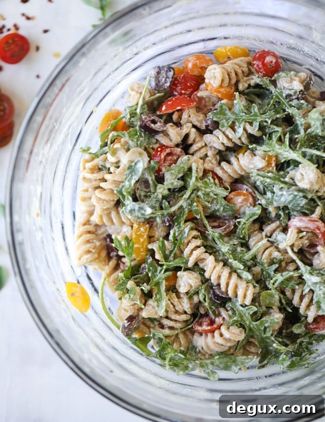 creamy goat cheese and arugula pasta salad I howsweeteats.com
